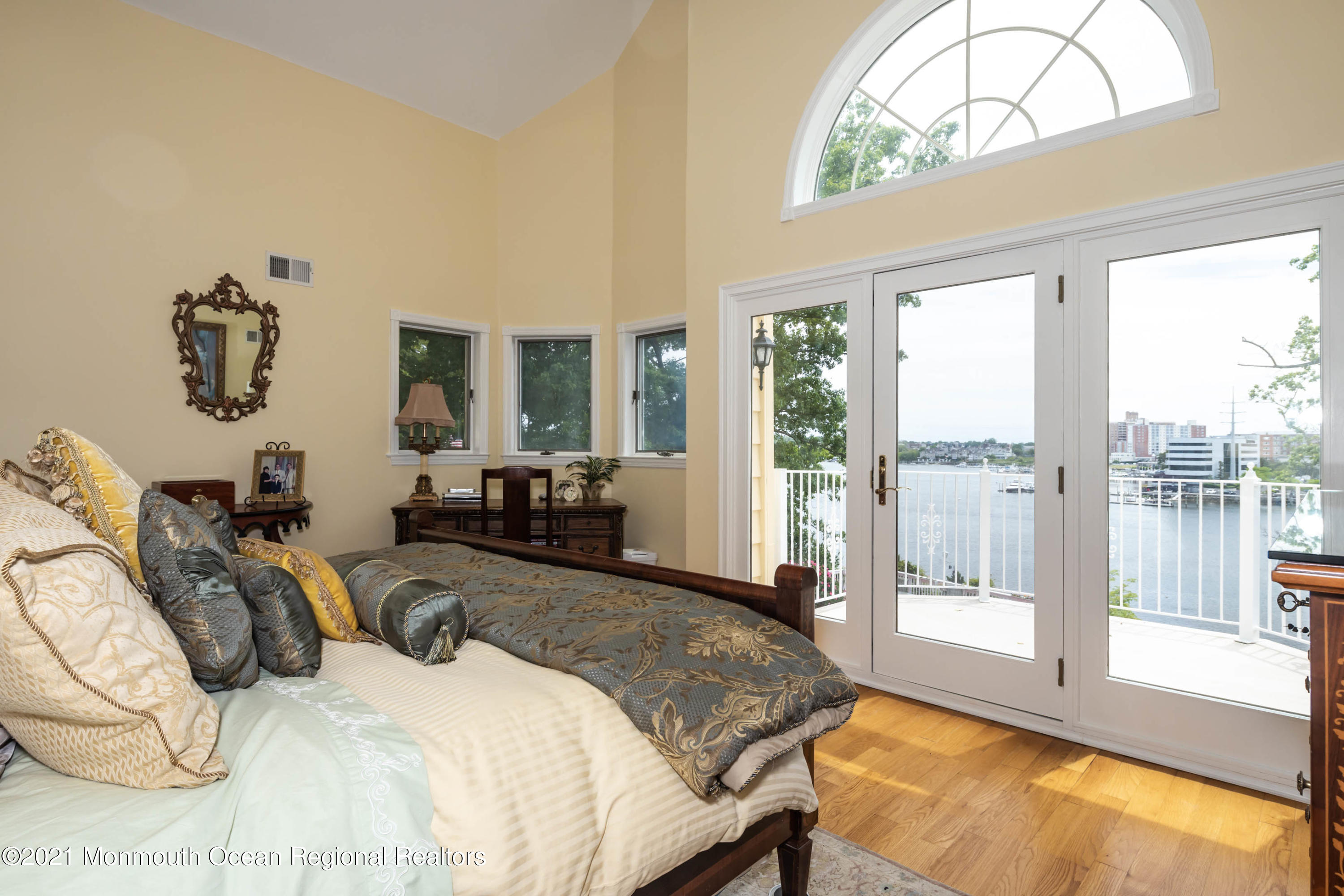 38 Conover Lane Red Bank, NJ 07701 - Photo 36 of 65 a bedroom with a bed and a large window