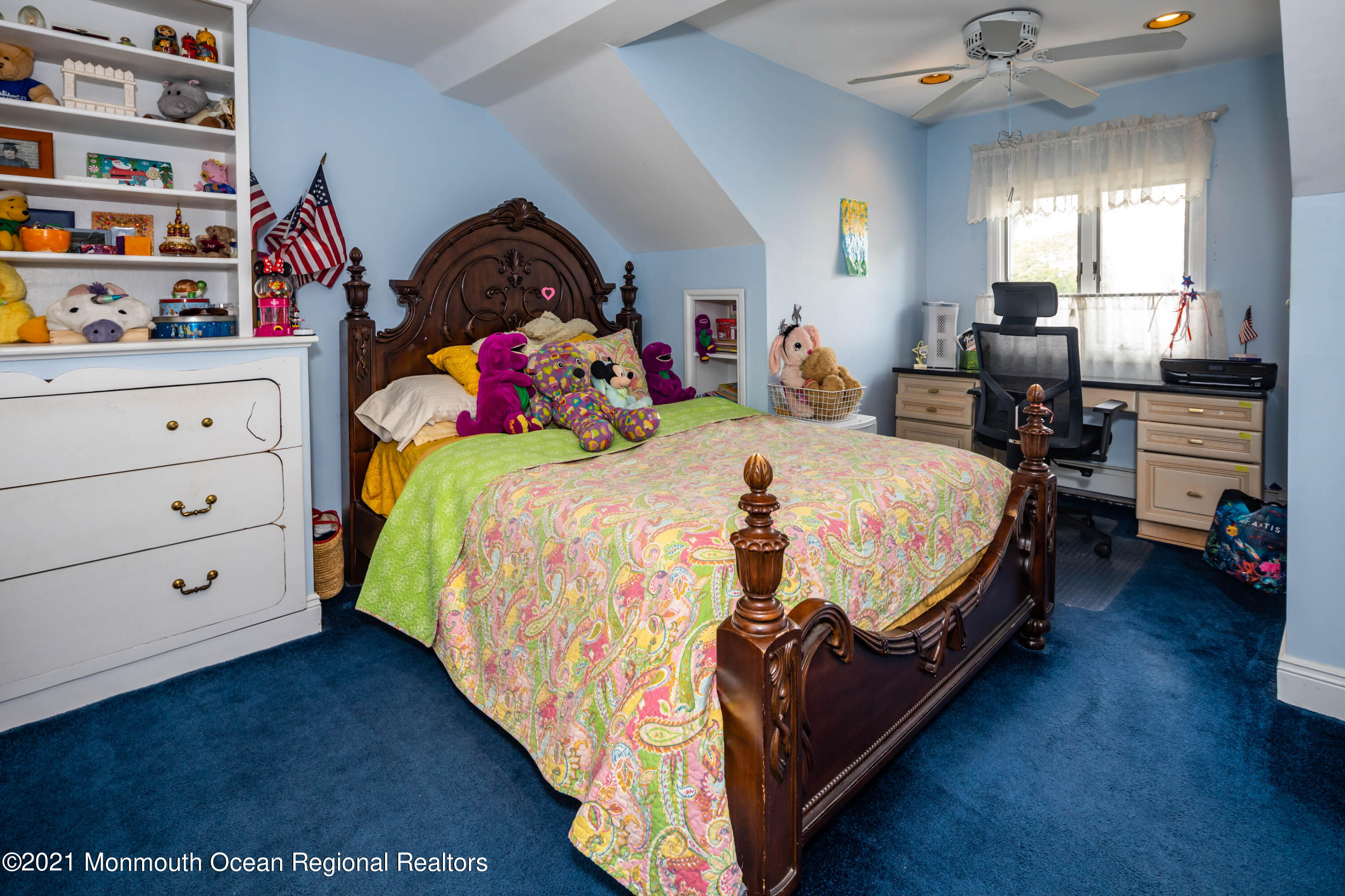 38 Conover Lane Red Bank, NJ 07701 - Photo 38 of 65 a bed room with a bed and a book shelf