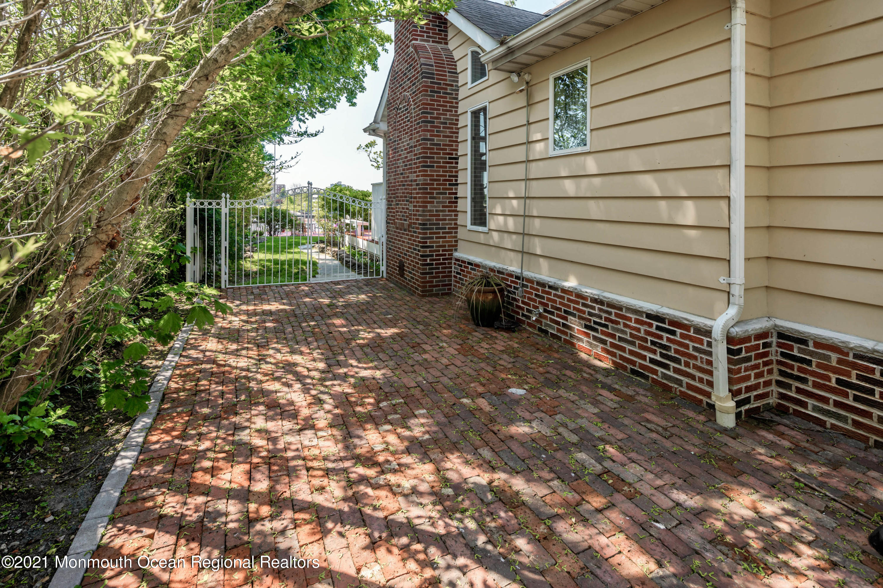 38 Conover Lane Red Bank, NJ 07701 - Photo 42 of 65 a view of a backyard with pathway