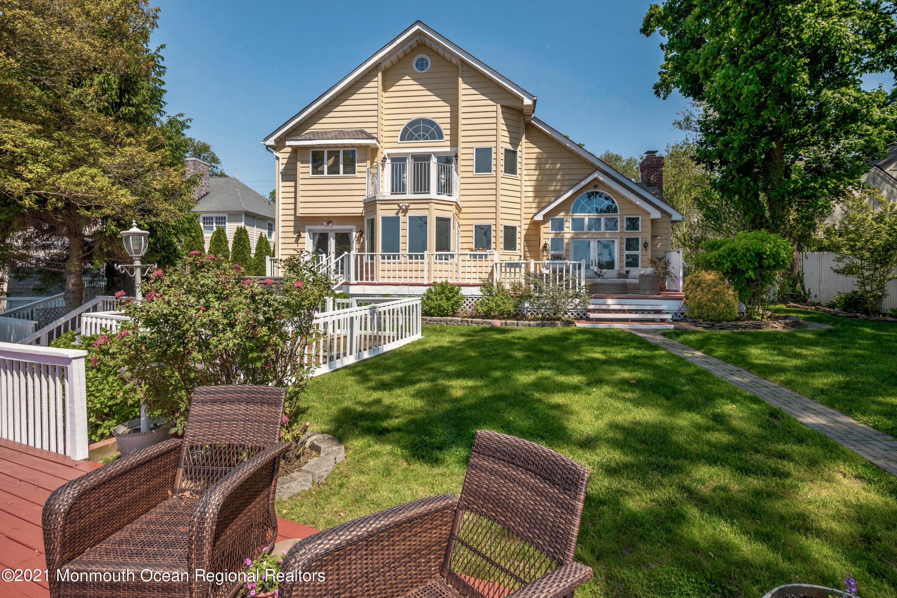 38 Conover Lane Red Bank, NJ 07701 - Photo 45 of 65 a front view of a house with a yard