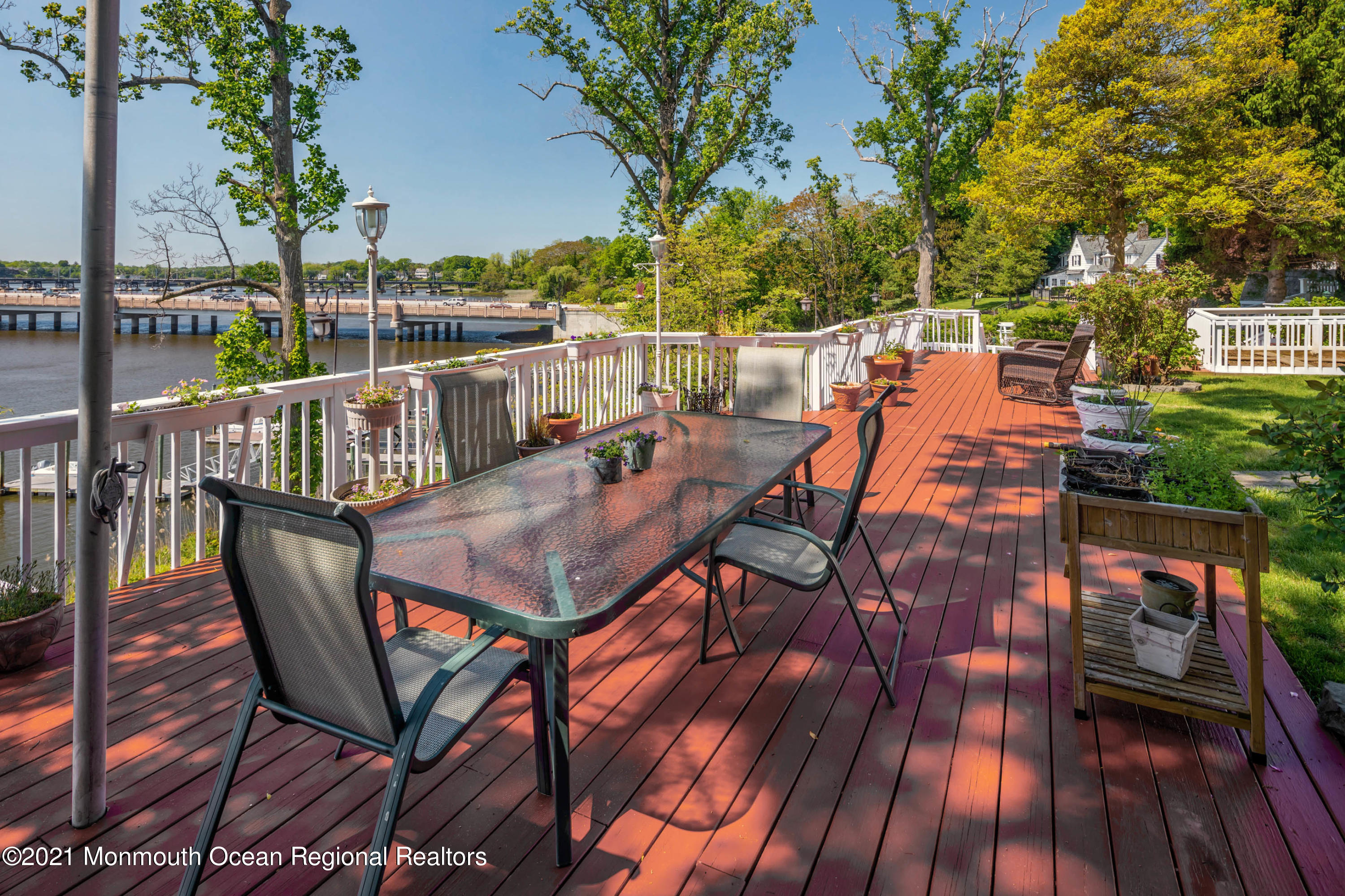 38 Conover Lane Red Bank, NJ 07701 - Photo 49 of 65 a view of balcony with wooden floor and outdoor seating