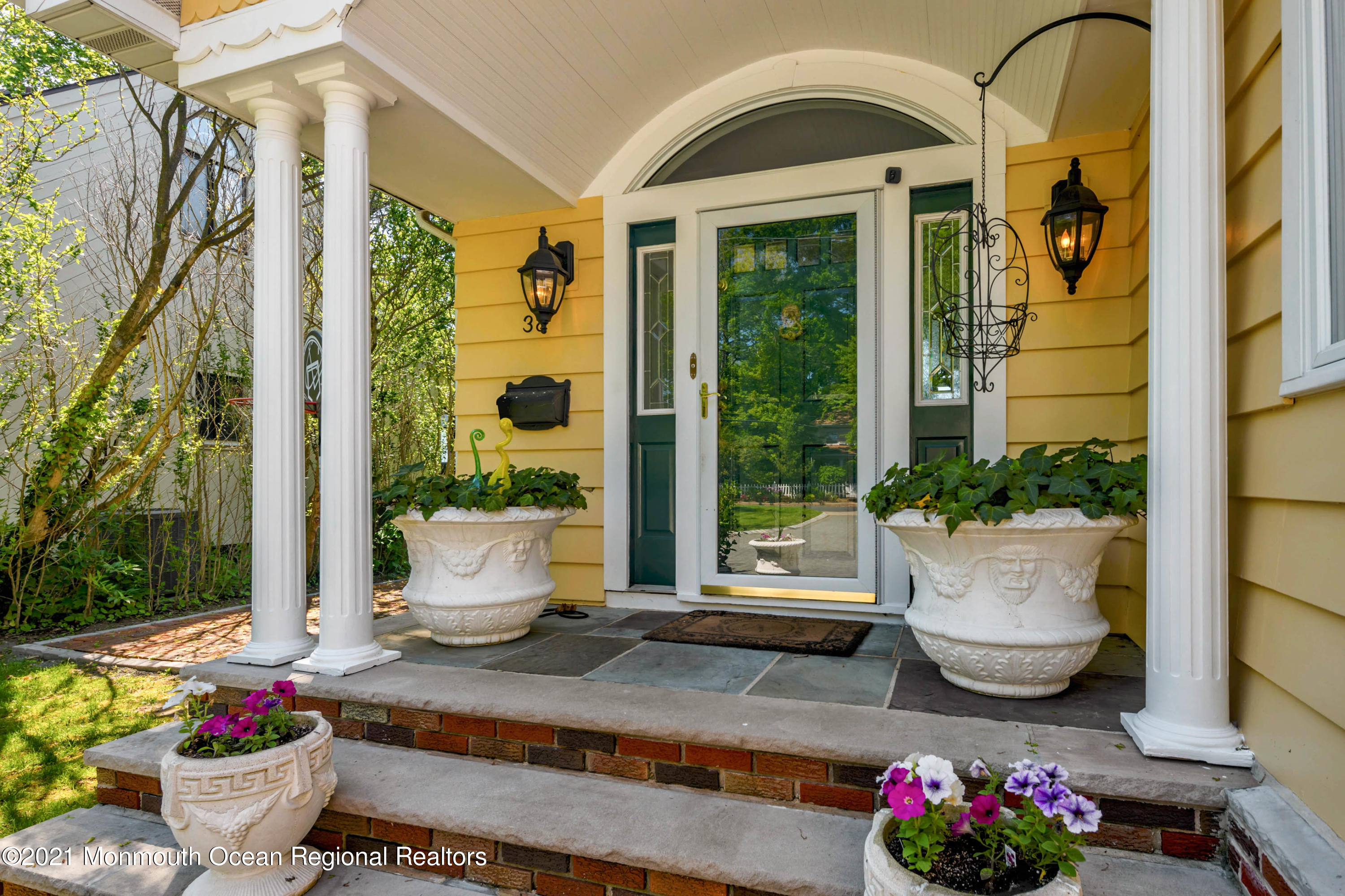 38 Conover Lane Red Bank, NJ 07701 - Photo 7 of 65 a front view of a house with outdoor seating