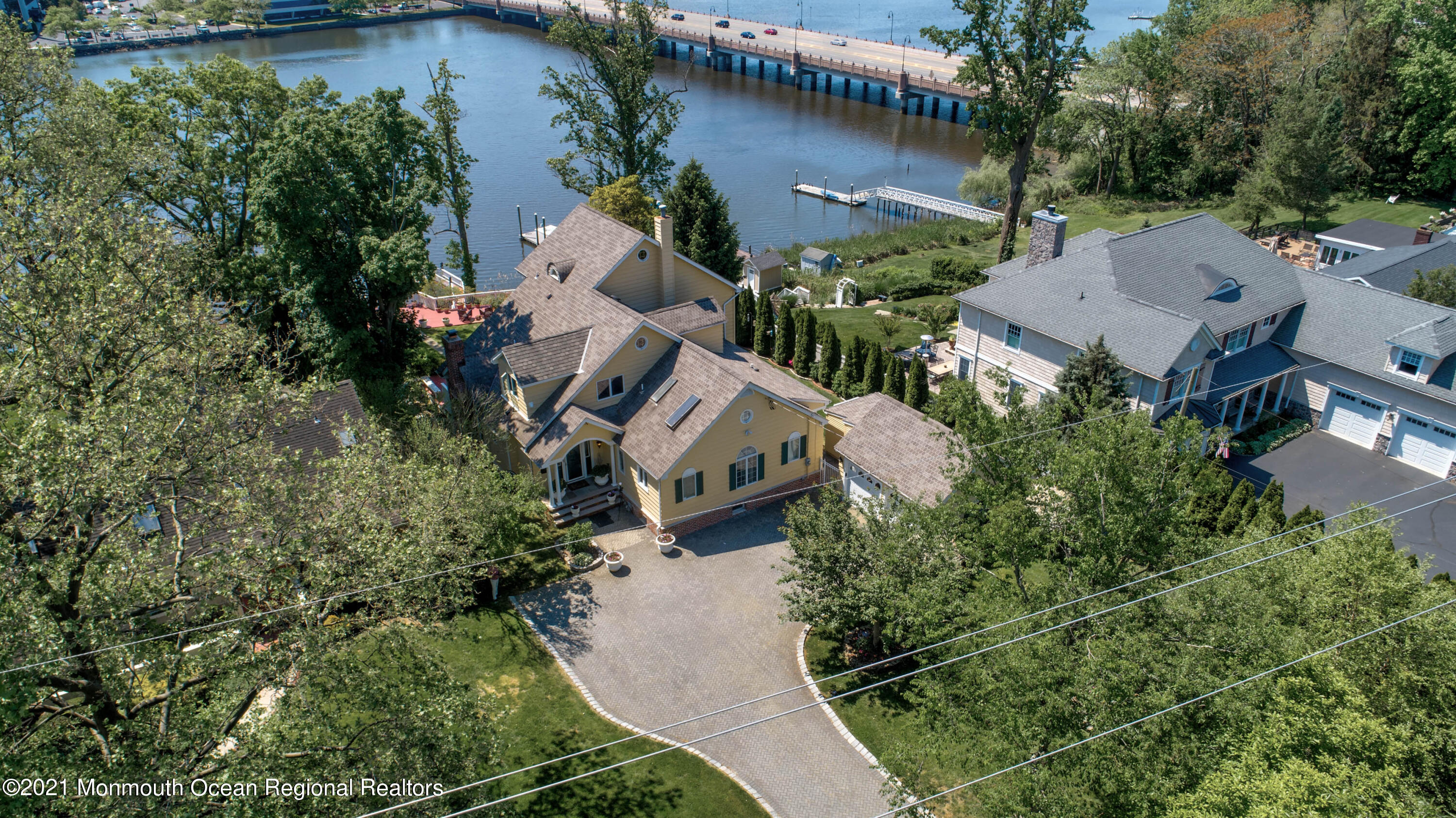 38 Conover Lane Red Bank, NJ 07701 - Photo 64 of 65 an aerial view of a house with outdoor space and lake view