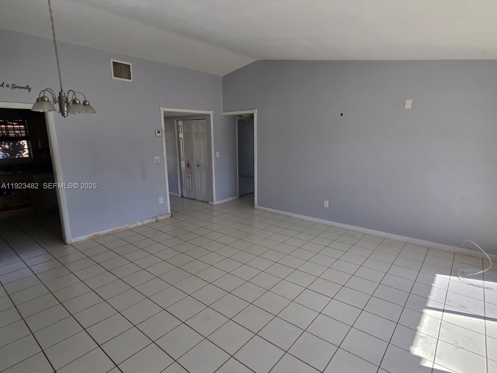 12412 Southwest 112th Terrace Miami, FL 33186 - Photo 12 of 18 a view of an empty room