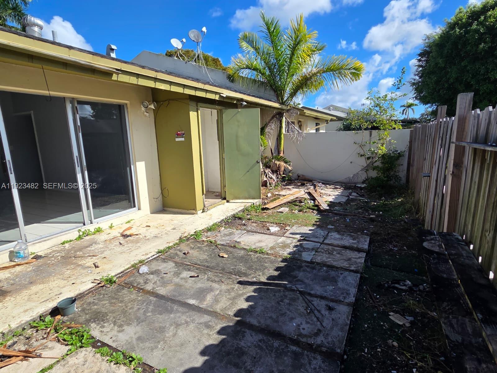 12412 Southwest 112th Terrace Miami, FL 33186 - Photo 18 of 18 a front view of house with small space