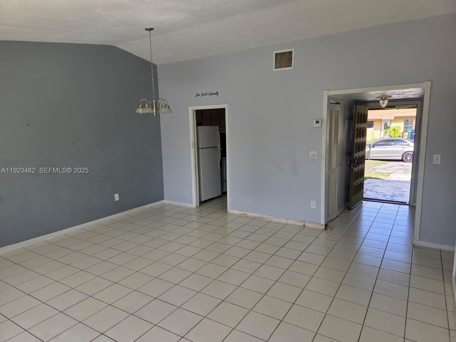 12412 Southwest 112th Terrace Miami, FL 33186 - Photo 3 of 18 a view of an empty room