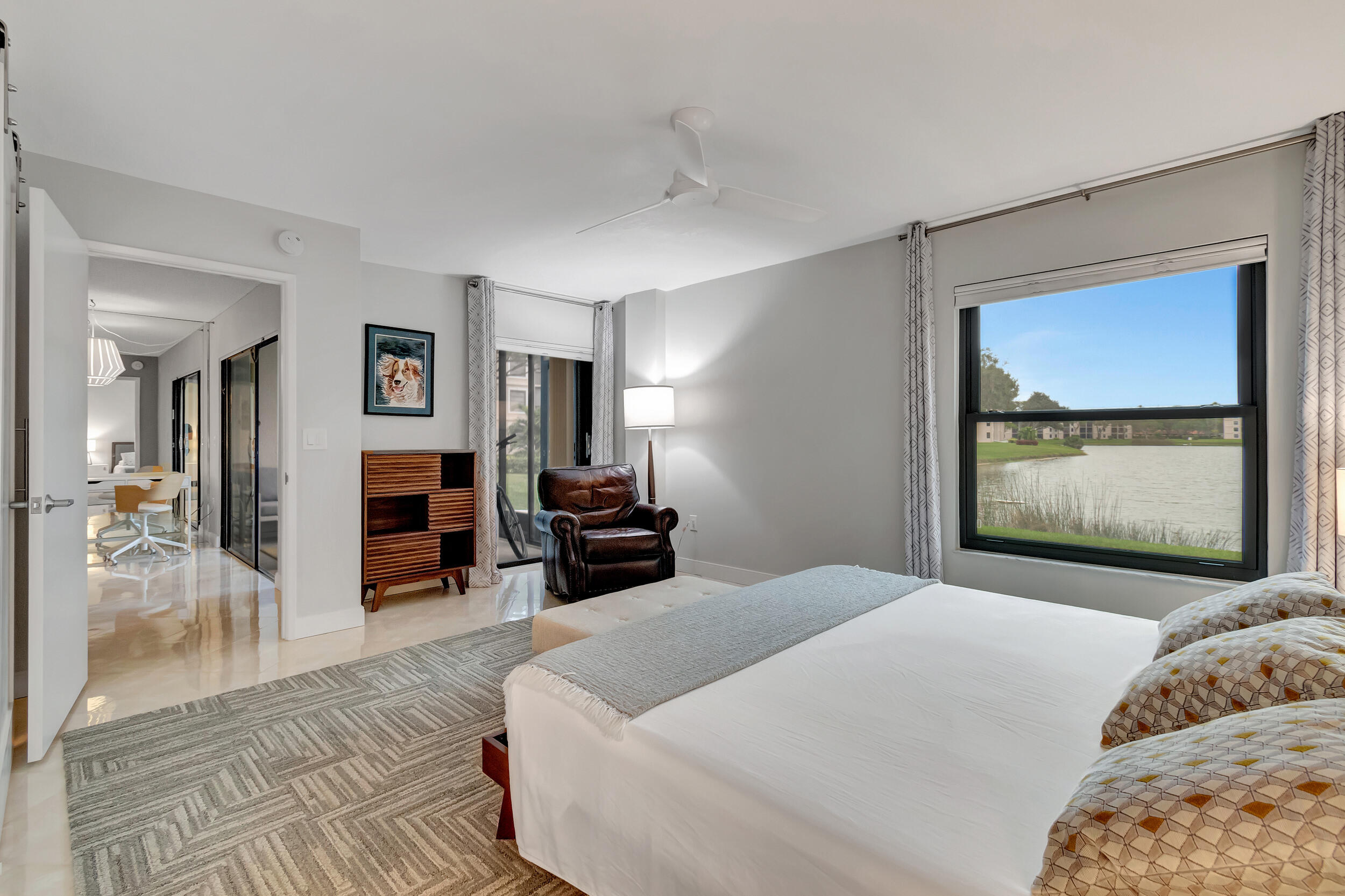 6269 Pointe Regal Circle, Unit 102 Delray Beach, FL 33484 - Photo 21 of 51 Owner's Bedroom