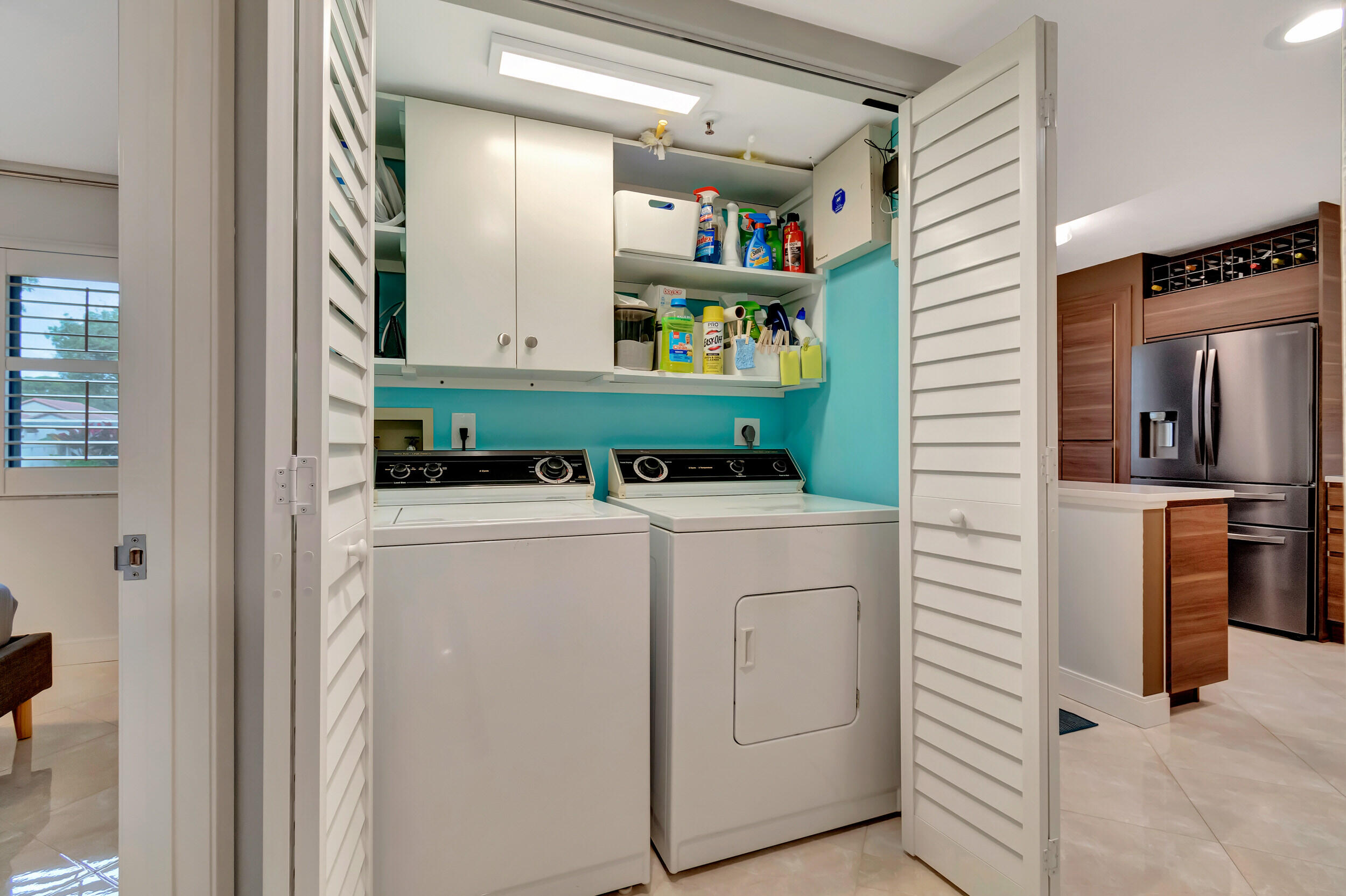 6269 Pointe Regal Circle, Unit 102 Delray Beach, FL 33484 - Photo 30 of 51 a utility room with dryer and washer