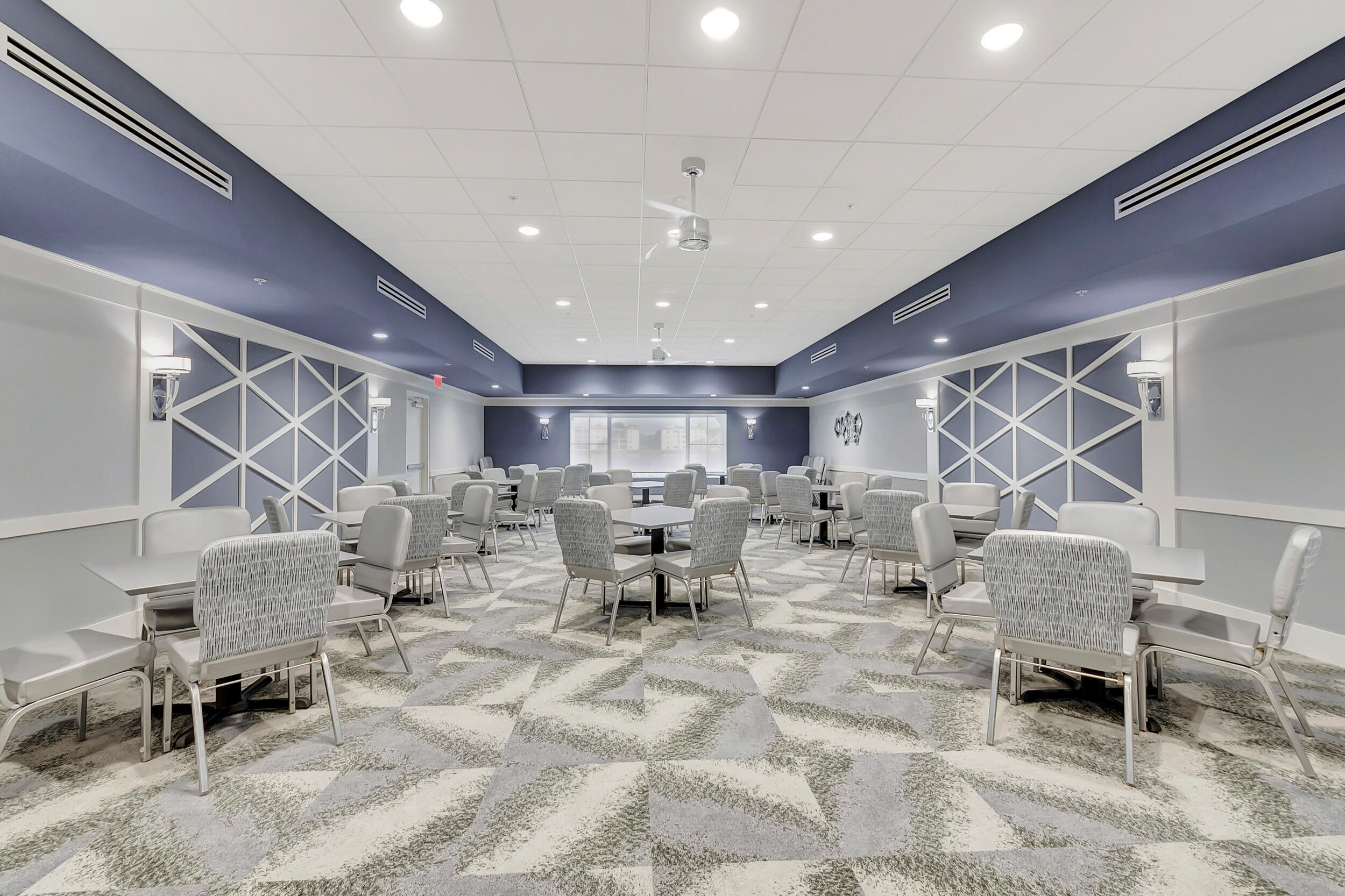 6269 Pointe Regal Circle, Unit 102 Delray Beach, FL 33484 - Photo 47 of 51 a living room with furniture and a table