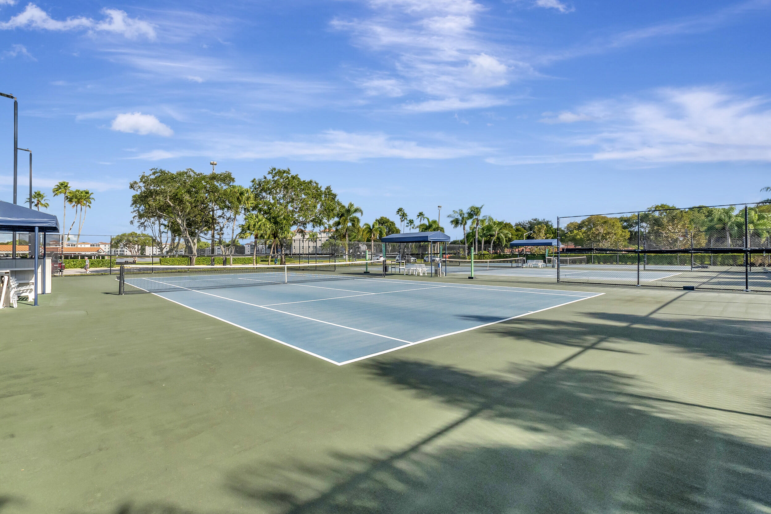6269 Pointe Regal Circle, Unit 102 Delray Beach, FL 33484 - Photo 49 of 51 a view of tennis court