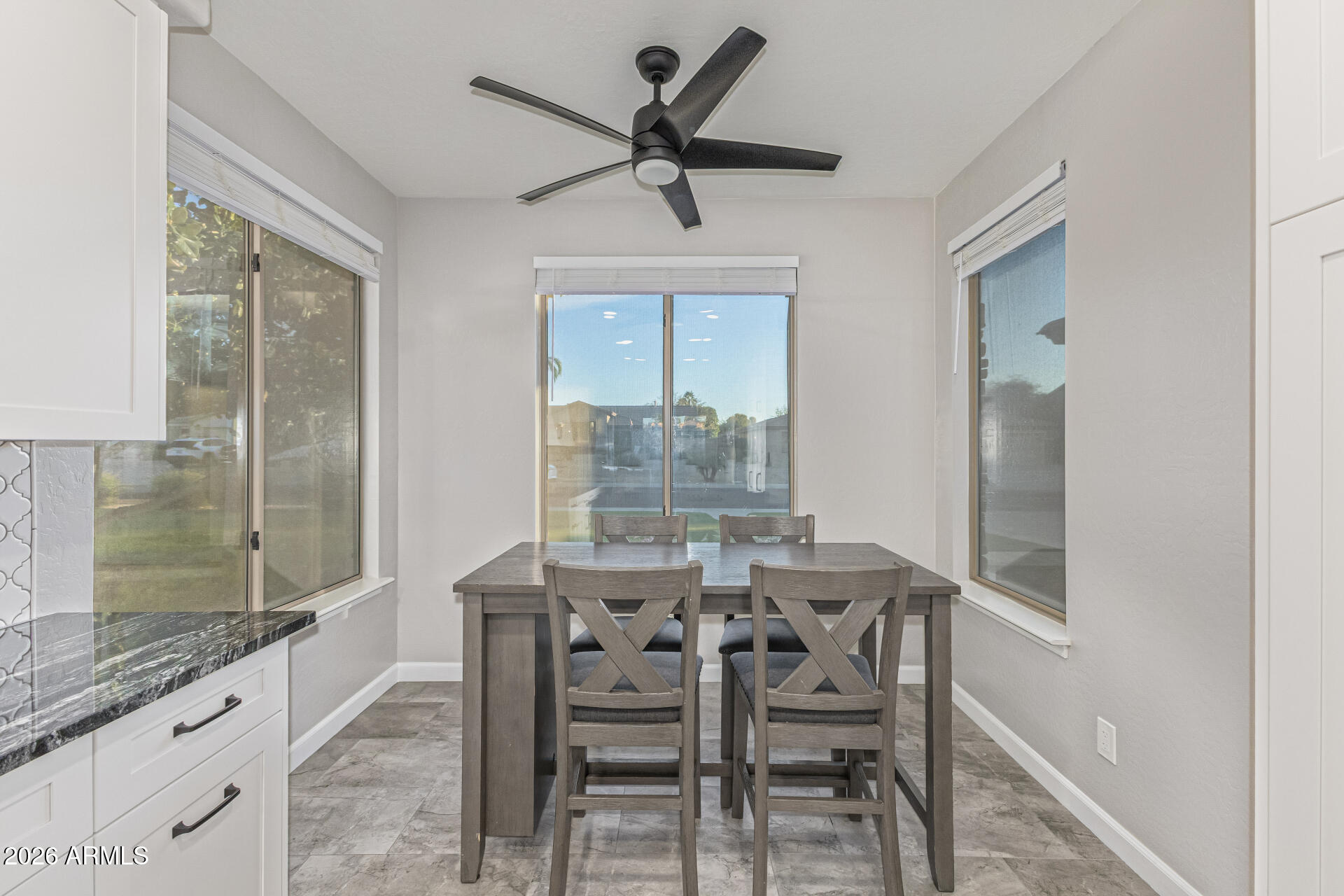 2500 East Milky Way Gilbert, AZ 85295 - Photo 12 of 33 a dining room with furniture and window