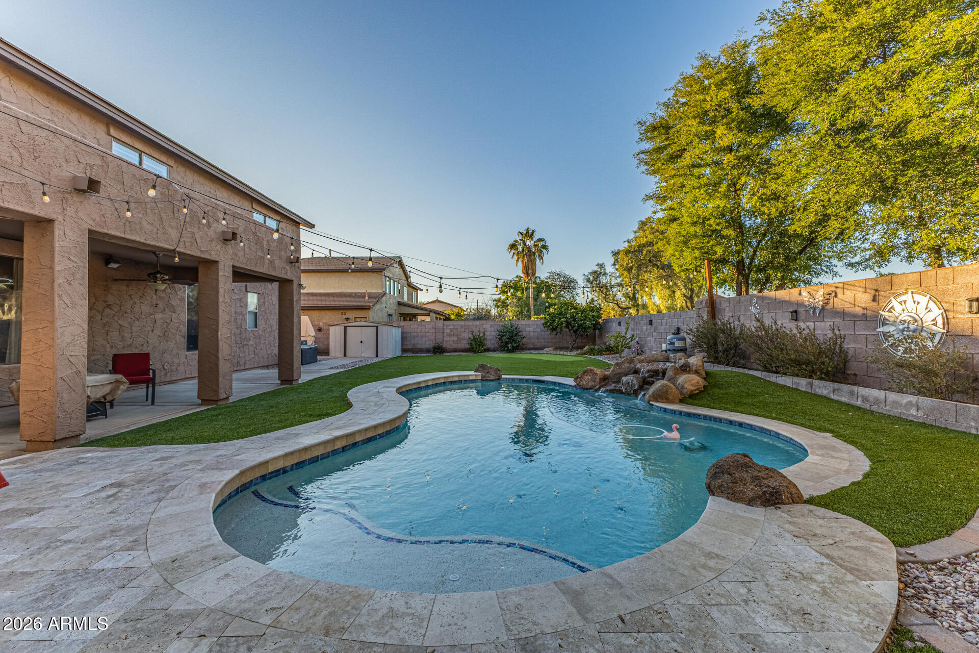 2500 East Milky Way Gilbert, AZ 85295 - Photo 27 of 33 a view of a swimming pool with a yard