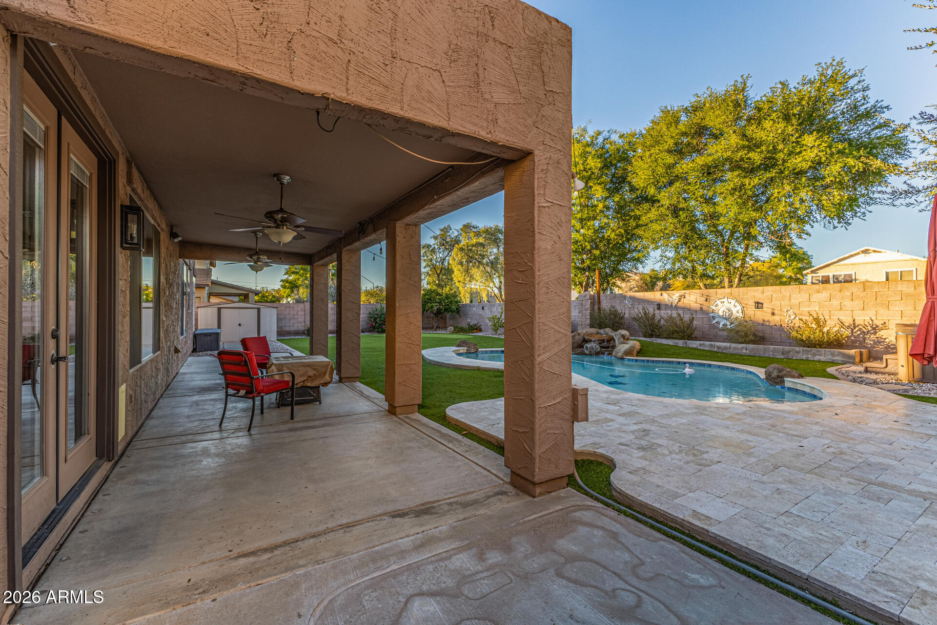 2500 East Milky Way Gilbert, AZ 85295 - Photo 30 of 33 a view of a porch with furniture and garden