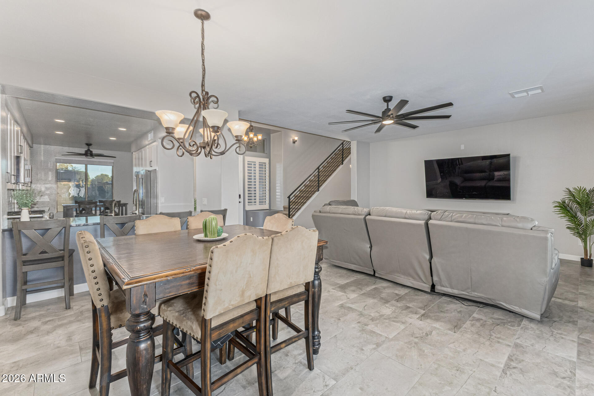 2500 East Milky Way Gilbert, AZ 85295 - Photo 7 of 33 a view of a dining room with furniture and a chandelier