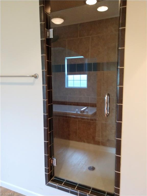 396 Valley Field Road Stoneville, NC 27048 - Photo 14 of 22 Door to Double Shower in master bathroom