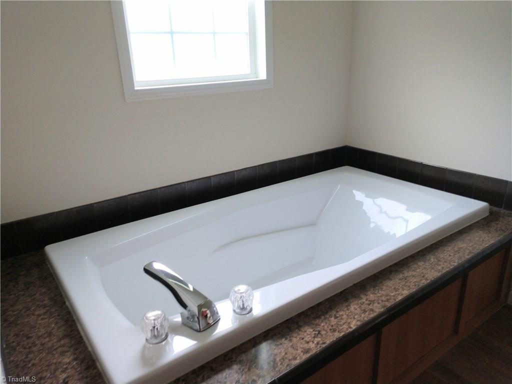 396 Valley Field Road Stoneville, NC 27048 - Photo 18 of 22 Garden Tub in the master bath