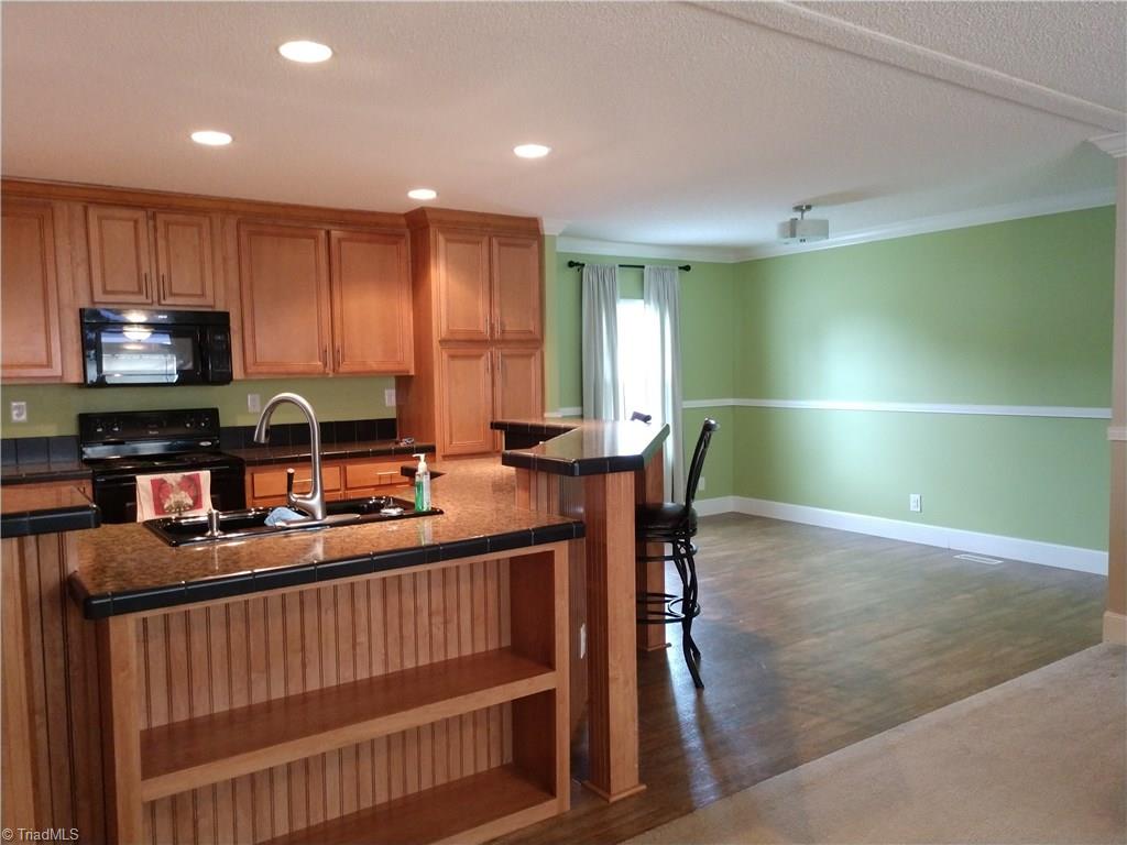 396 Valley Field Road Stoneville, NC 27048 - Photo 7 of 22 Kitchen and dining room
