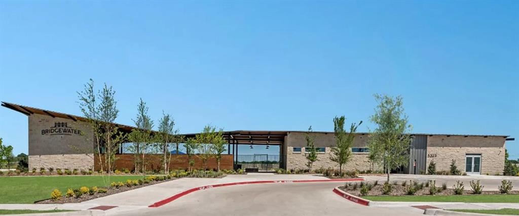 209 Boxberry Way Princeton, TX 75407 - Photo 25 of 34 a front view of a house with a yard and potted plants