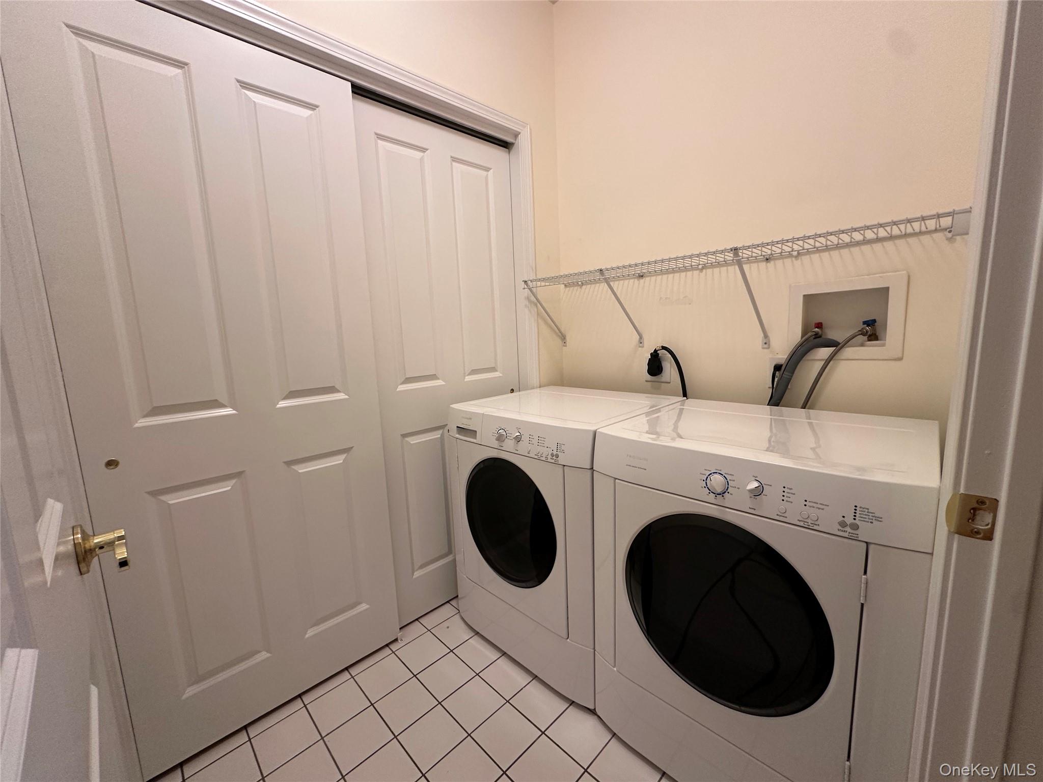 75 Quaker Avenue, Unit 315 Cornwall, NY 12518 - Photo 18 of 48 a utility room with dryer and washer