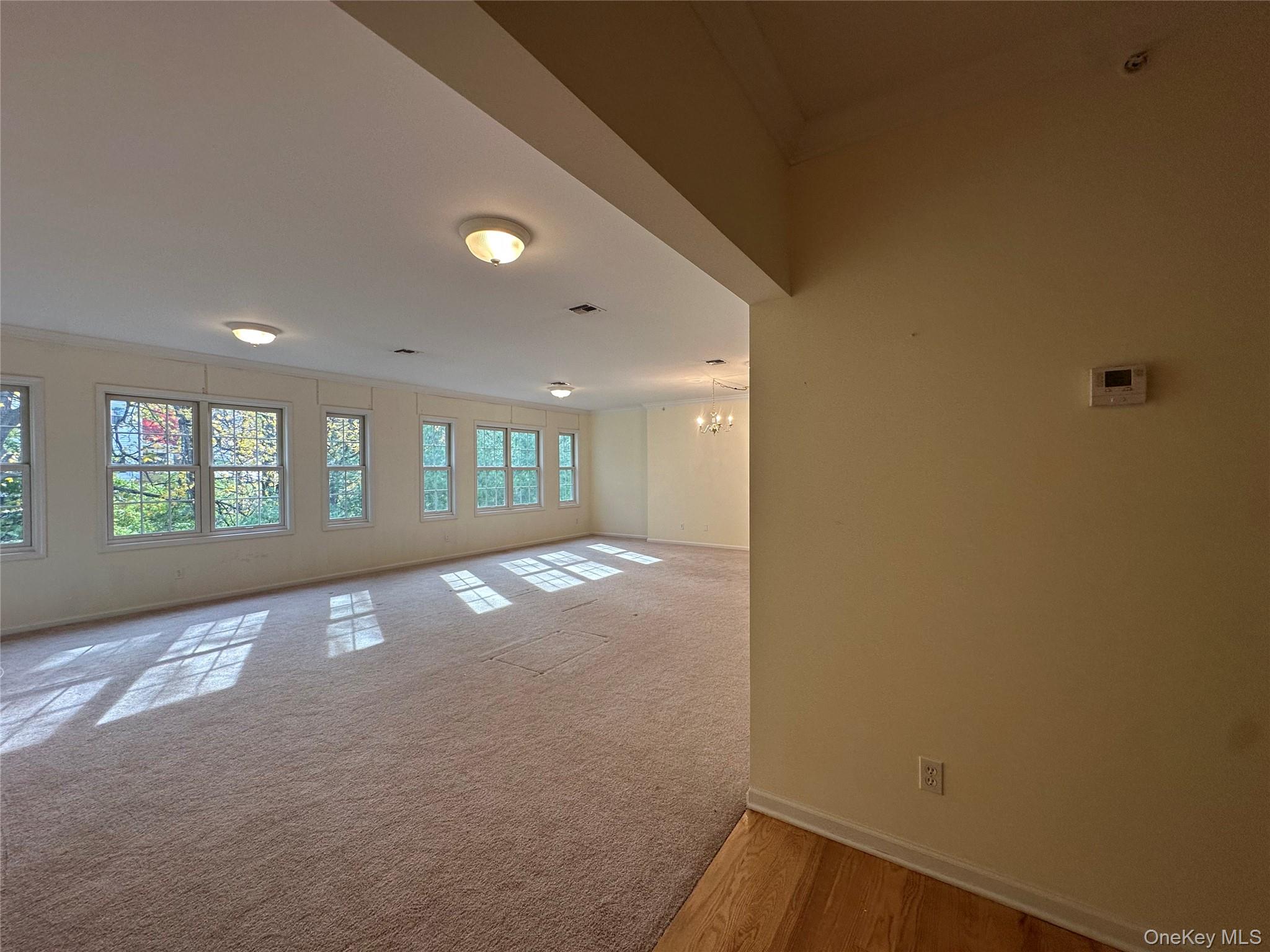 75 Quaker Avenue, Unit 315 Cornwall, NY 12518 - Photo 27 of 48 a view of an empty room with a window