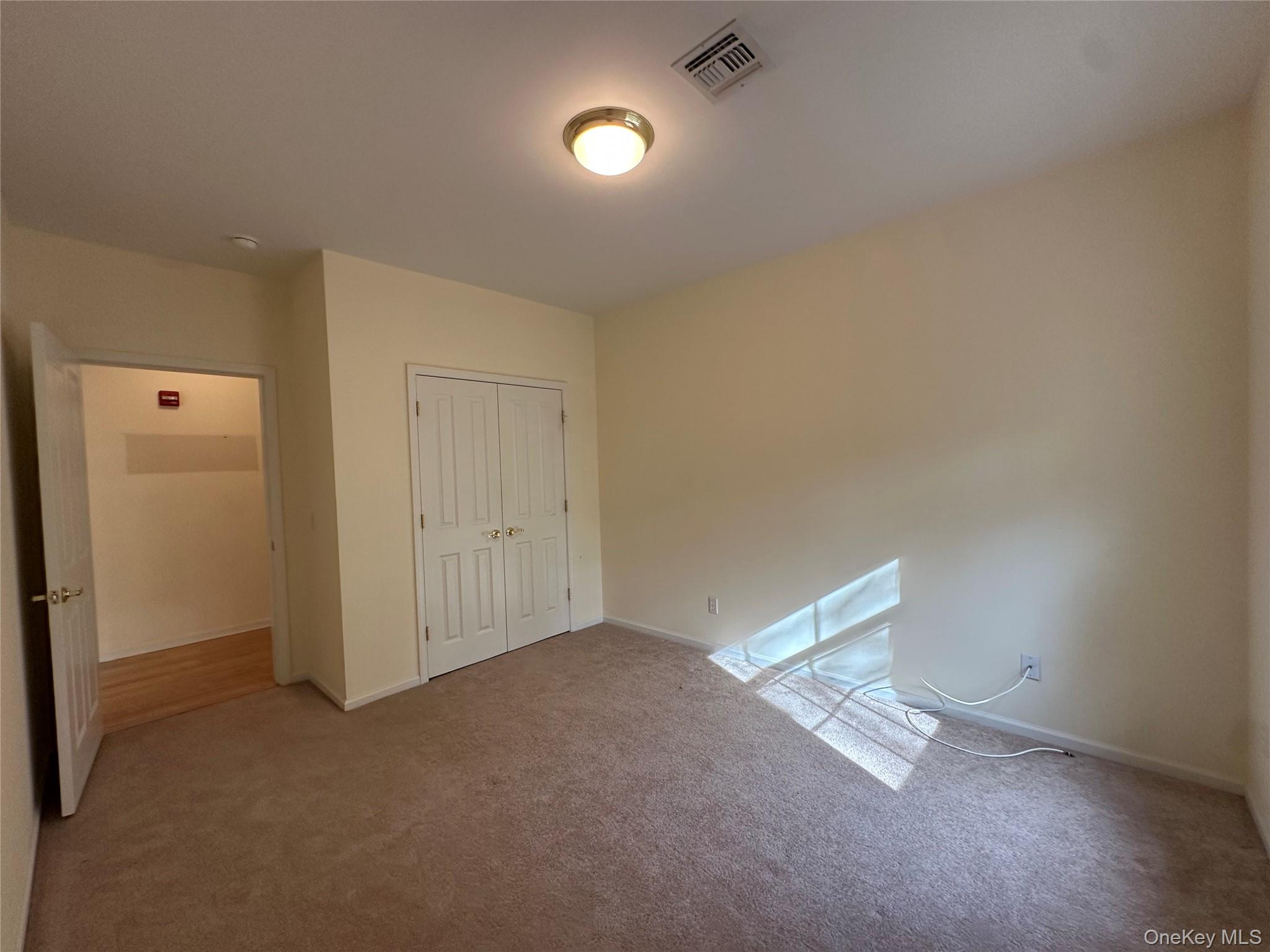 75 Quaker Avenue, Unit 315 Cornwall, NY 12518 - Photo 40 of 48 a view of empty room