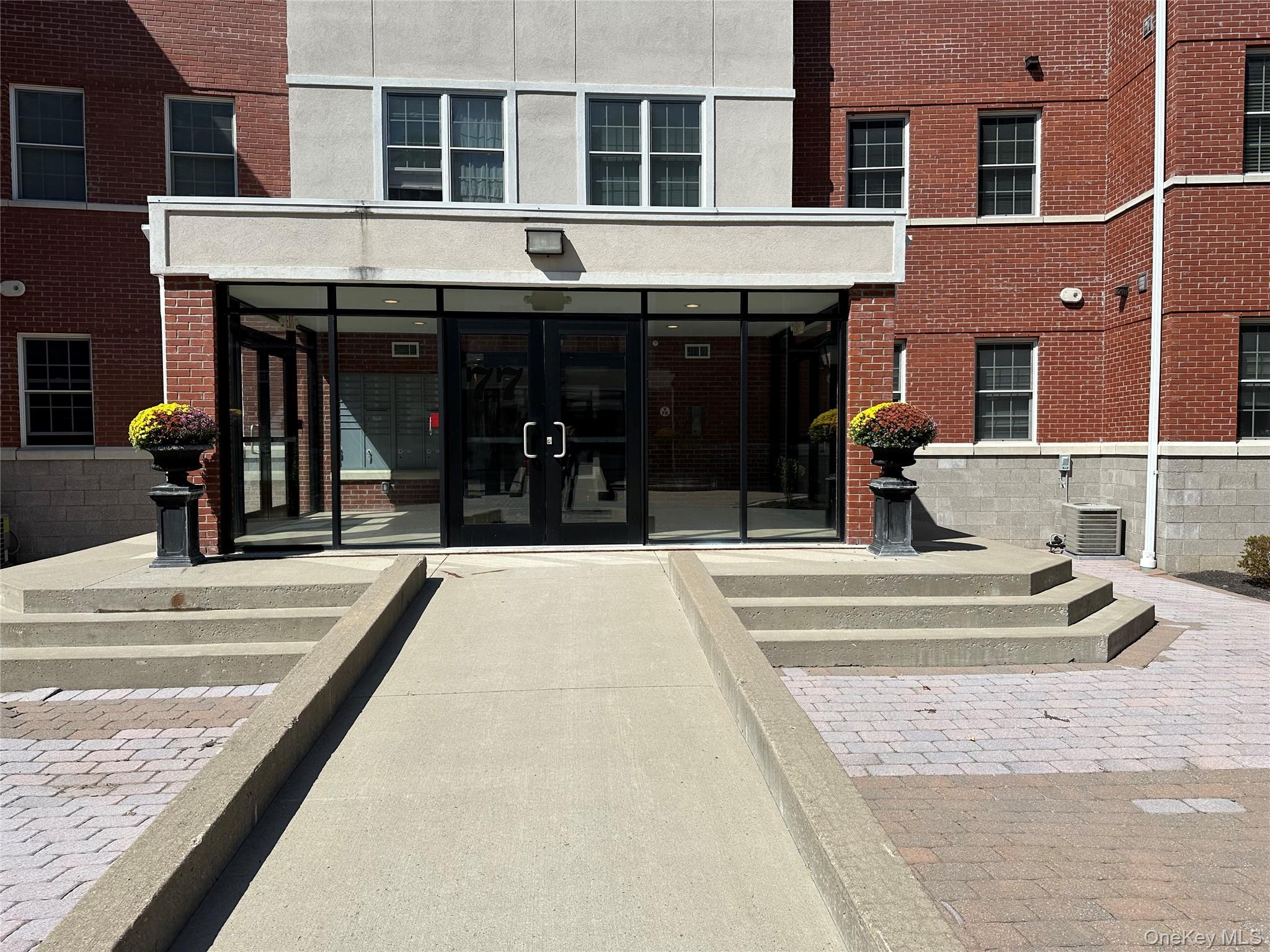 75 Quaker Avenue, Unit 315 Cornwall, NY 12518 - Photo 41 of 48 a view of a building with a swimming pool