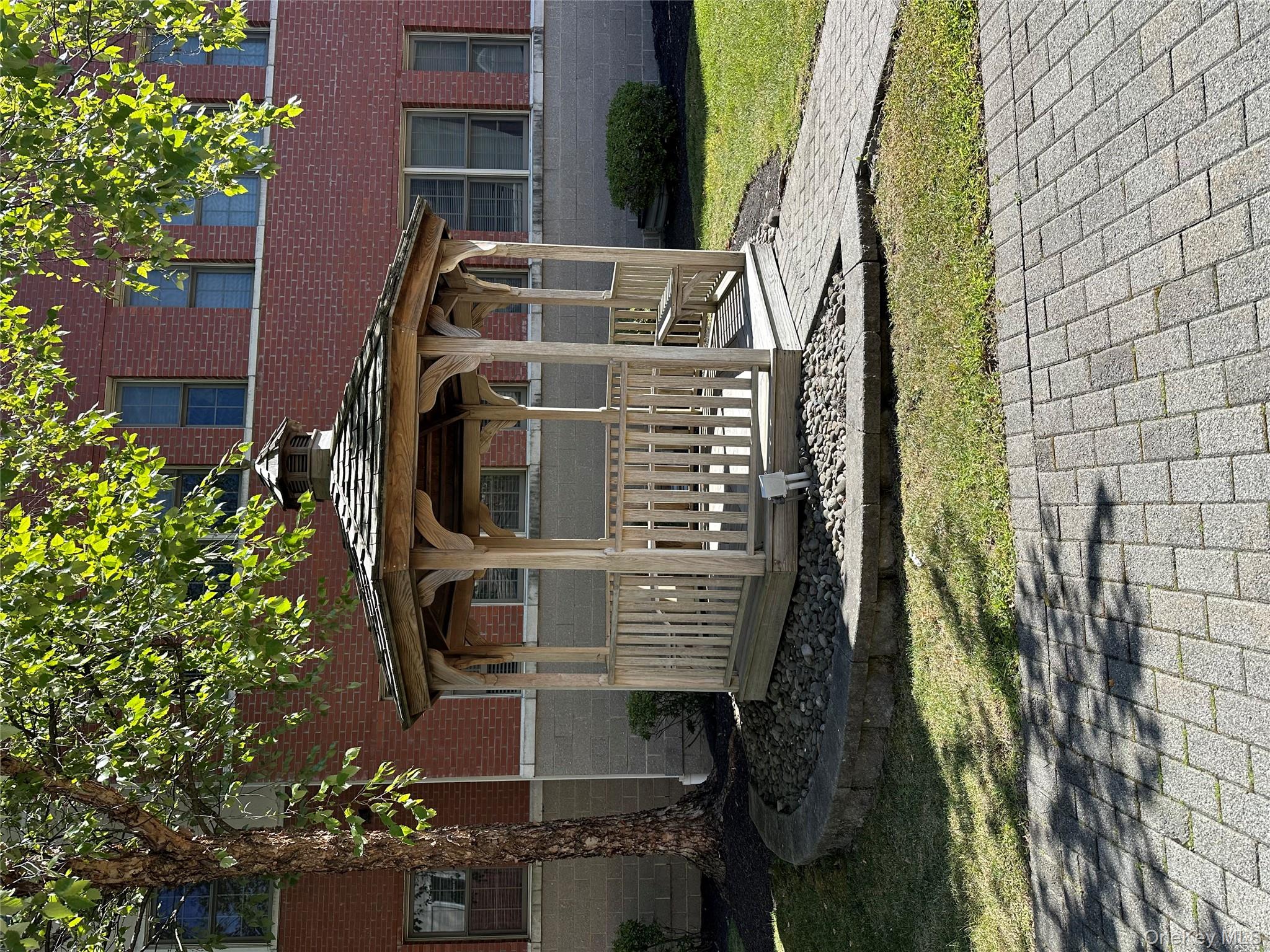 75 Quaker Avenue, Unit 315 Cornwall, NY 12518 - Photo 43 of 48 a front view of a house with a yard