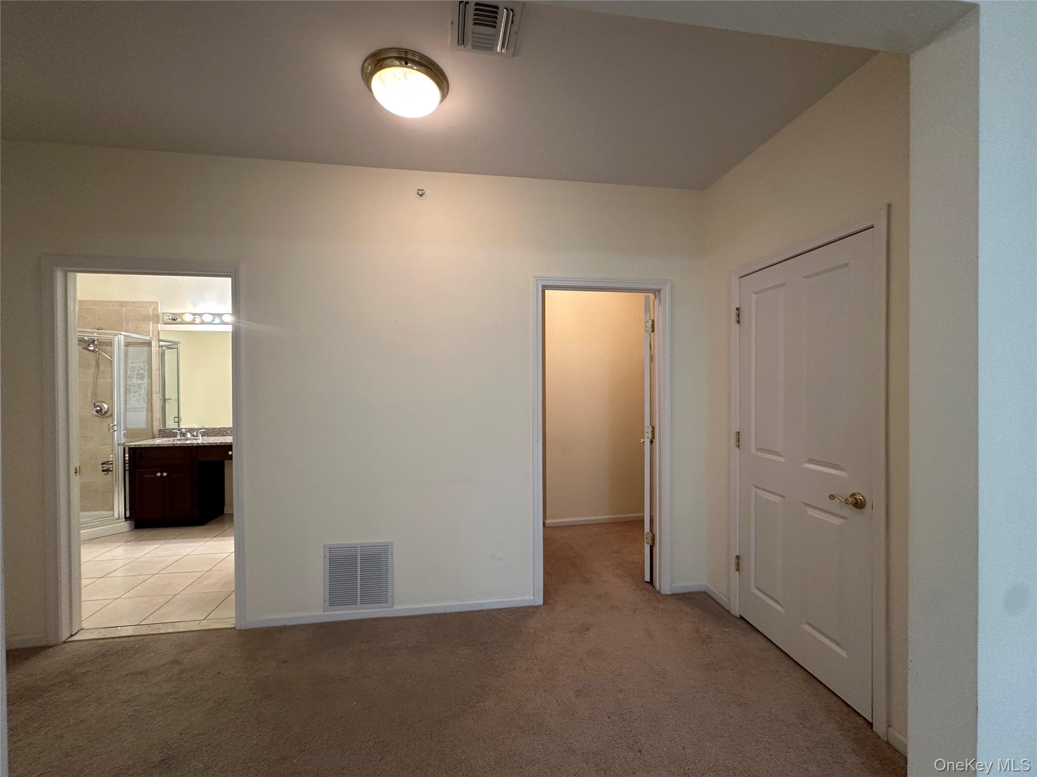 75 Quaker Avenue, Unit 315 Cornwall, NY 12518 - Photo 48 of 48 an empty room with windows