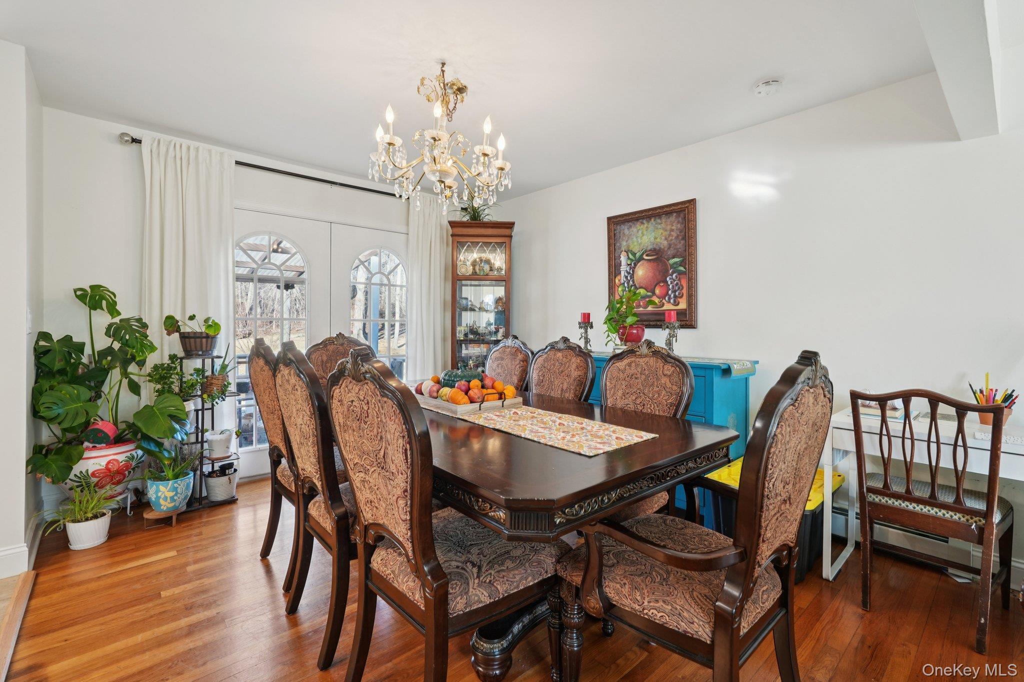 52 Pine Brook Road Monsey, NY 10952 - Photo 11 of 47 a view of a dining room with furniture wooden floor and chandelier