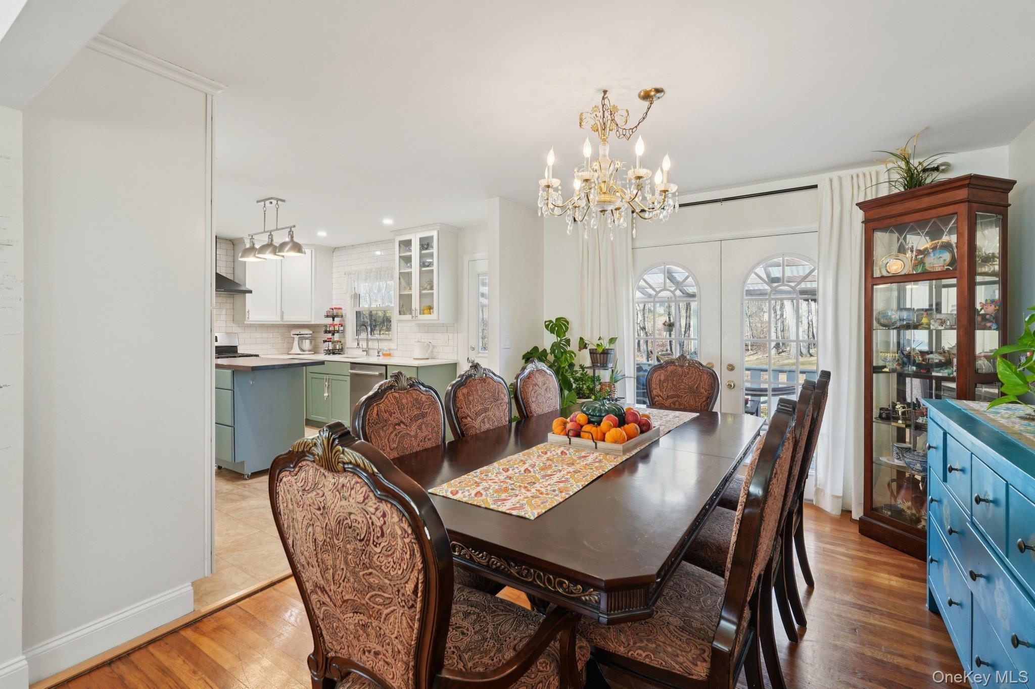 52 Pine Brook Road Monsey, NY 10952 - Photo 12 of 47 a view of a dining room with furniture window and wooden floor