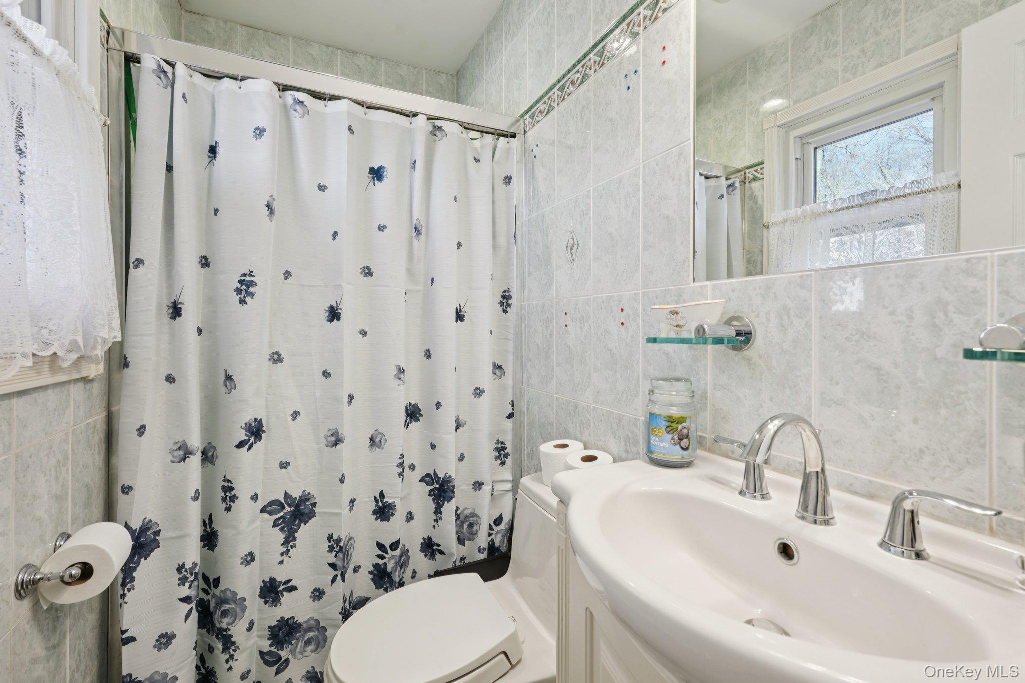 52 Pine Brook Road Monsey, NY 10952 - Photo 26 of 47 a bathroom with a sink toilet and shower