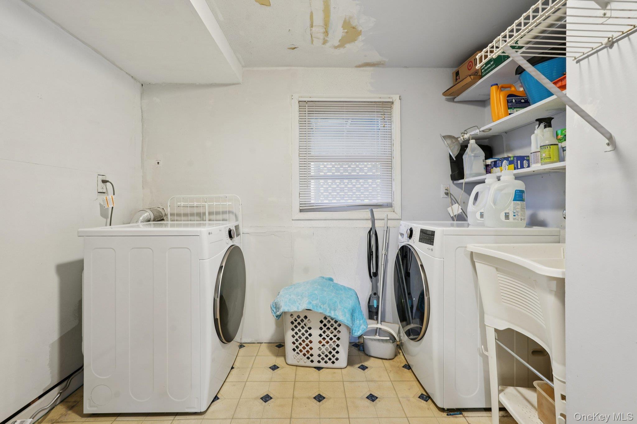 52 Pine Brook Road Monsey, NY 10952 - Photo 34 of 47 a utility room with dryer and washer