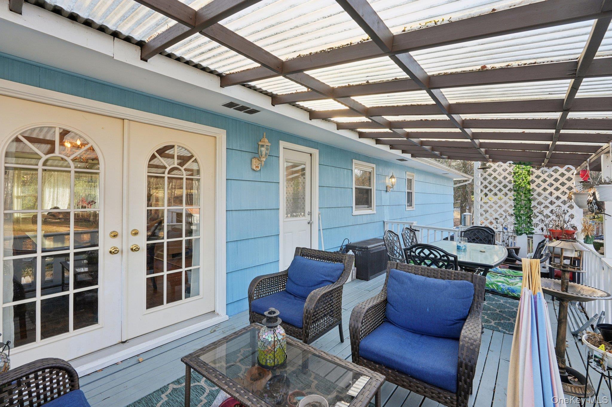 52 Pine Brook Road Monsey, NY 10952 - Photo 36 of 47 a outdoor living space with furniture and lots of windows