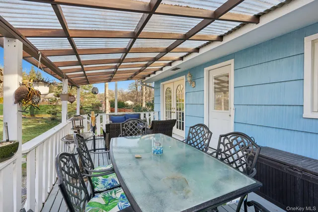 a backyard of a house with lots of green space and fountain