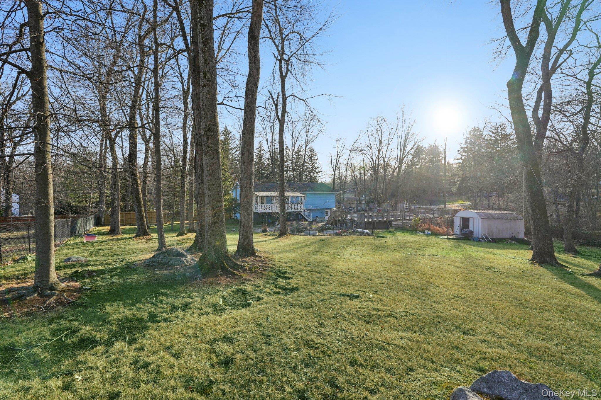 52 Pine Brook Road Monsey, NY 10952 - Photo 42 of 47 a backyard of a house with lots of green space