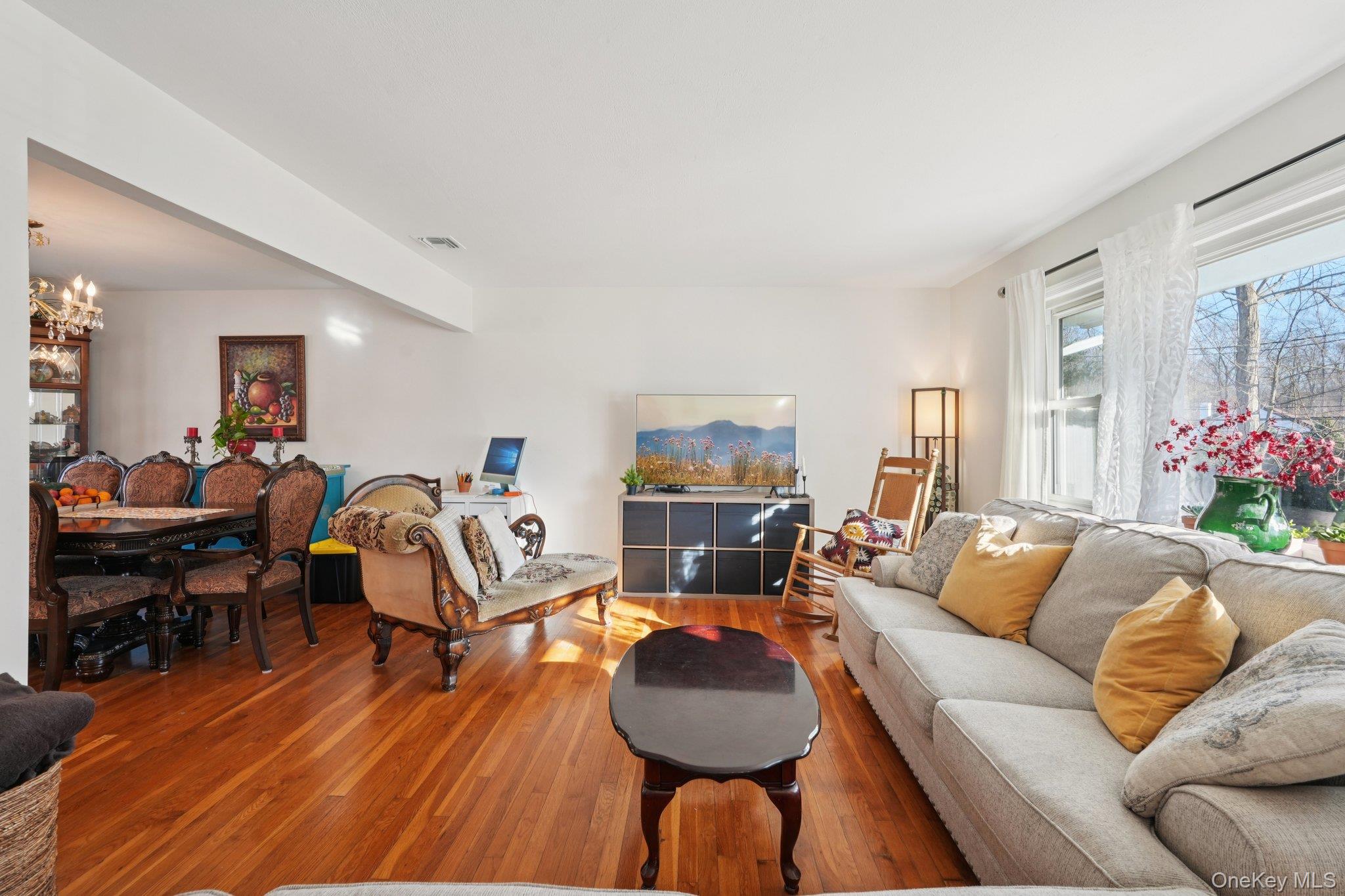 52 Pine Brook Road Monsey, NY 10952 - Photo 8 of 47 a living room with furniture and a wooden floor
