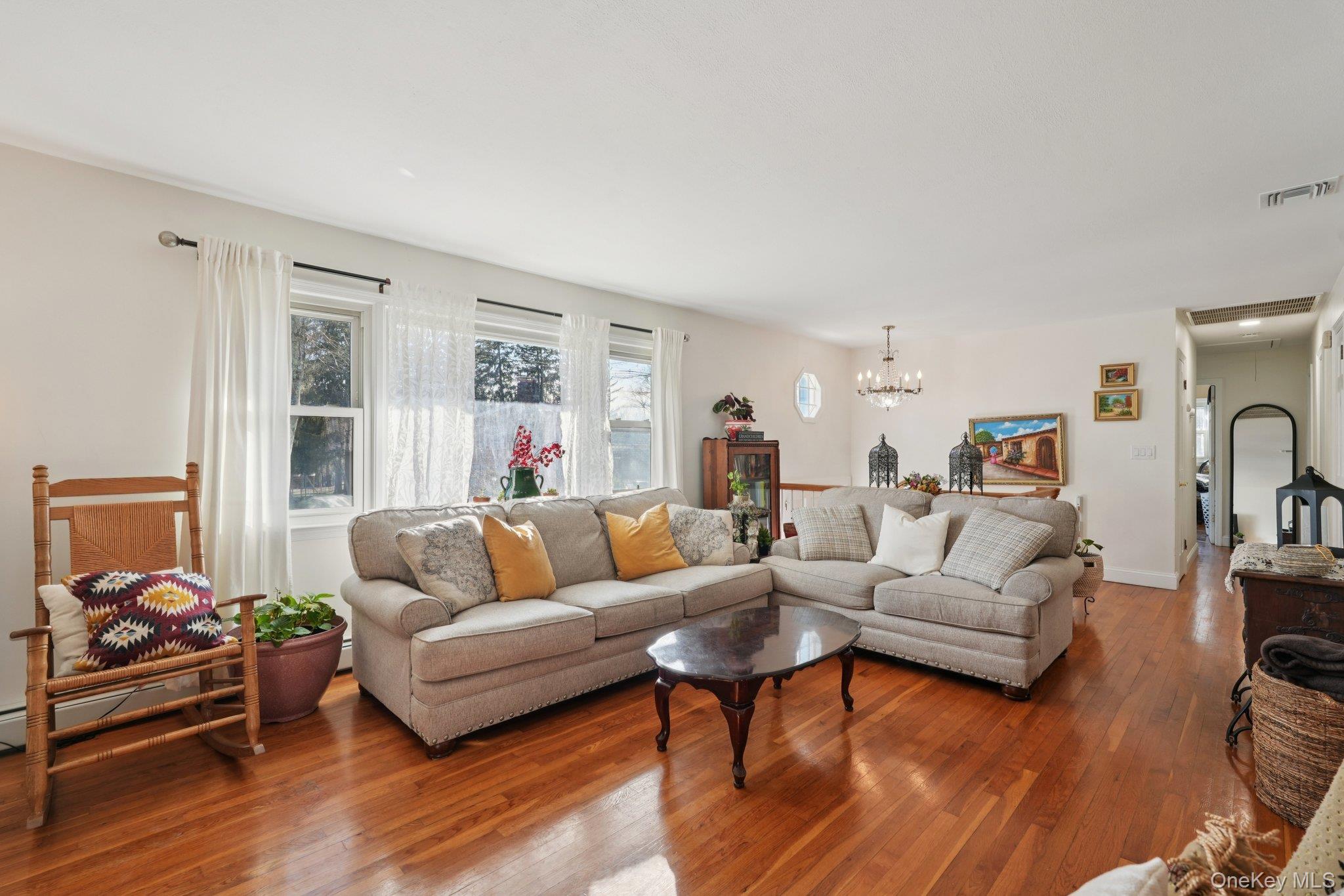 52 Pine Brook Road Monsey, NY 10952 - Photo 9 of 47 a living room with furniture or couch and a window