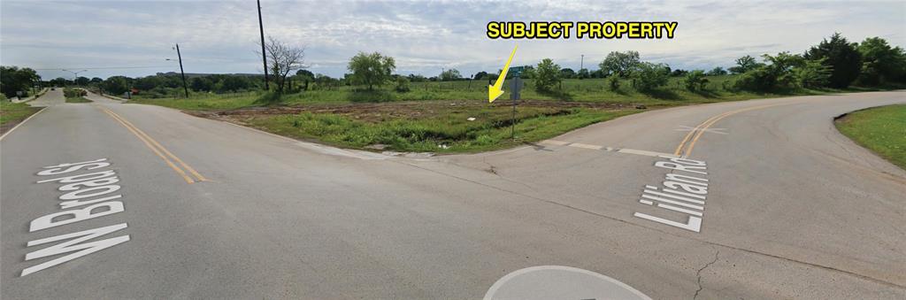 801 Lillian Road Mansfield, TX 76063 - Photo 5 of 6 a view of a street with potted plants on both side of it