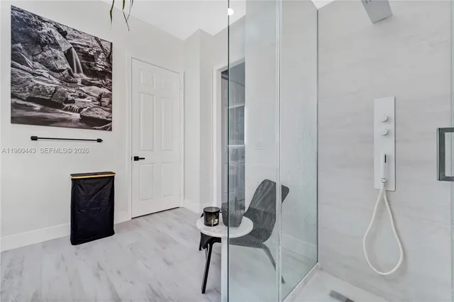 a room with furniture and wooden floor