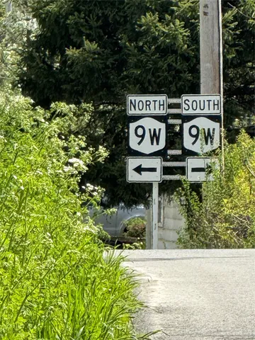 a sign broad on the side of a road