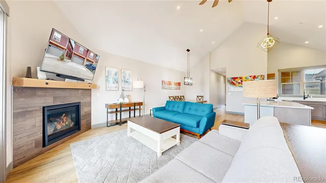 a kitchen with stainless steel appliances granite countertop a refrigerator stove and sink