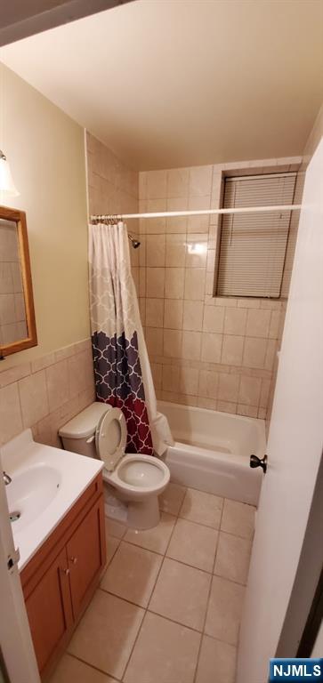 467 Hudson Street Hackensack, NJ 07601 - Photo 13 of 13 a bathroom with a sink a toilet and shower
