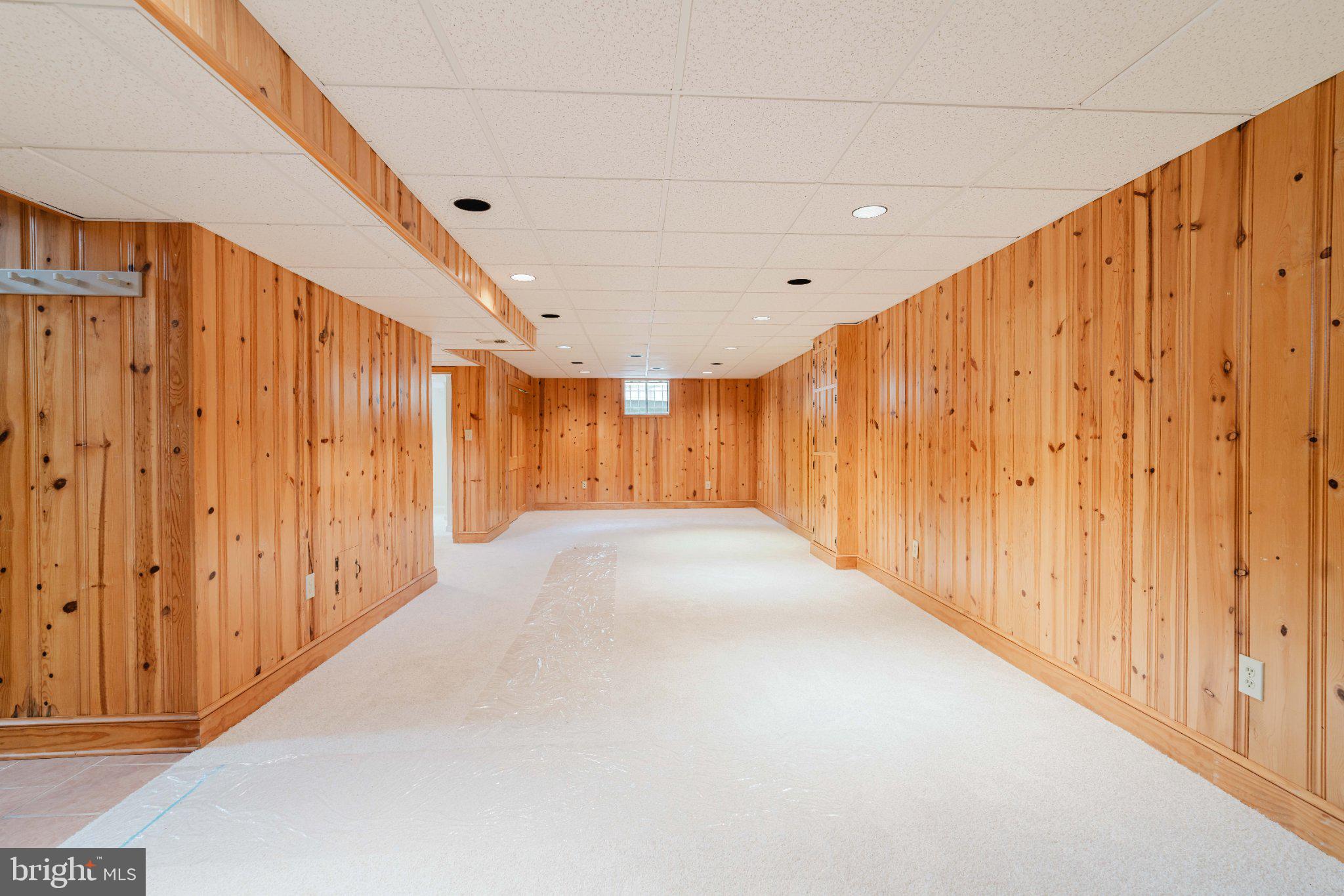 10200 Duvawn Place Silver Spring, MD 20902 - Photo 31 of 42 Spacious, warm wood-paneled retreat.