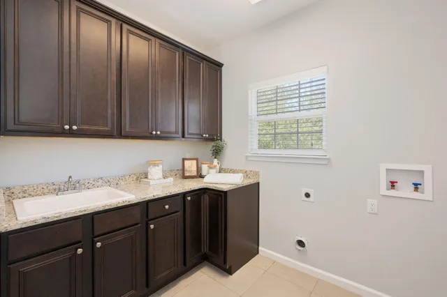 a utility room with cabinets