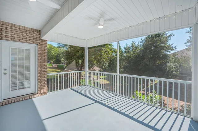 a balcony with wooden floor in outdoor space