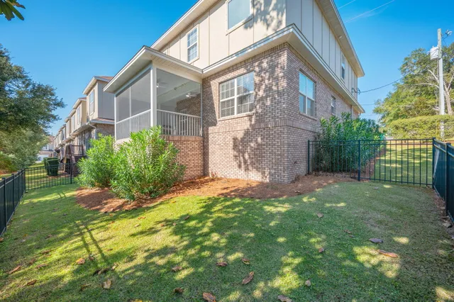 a view of a building with a yard