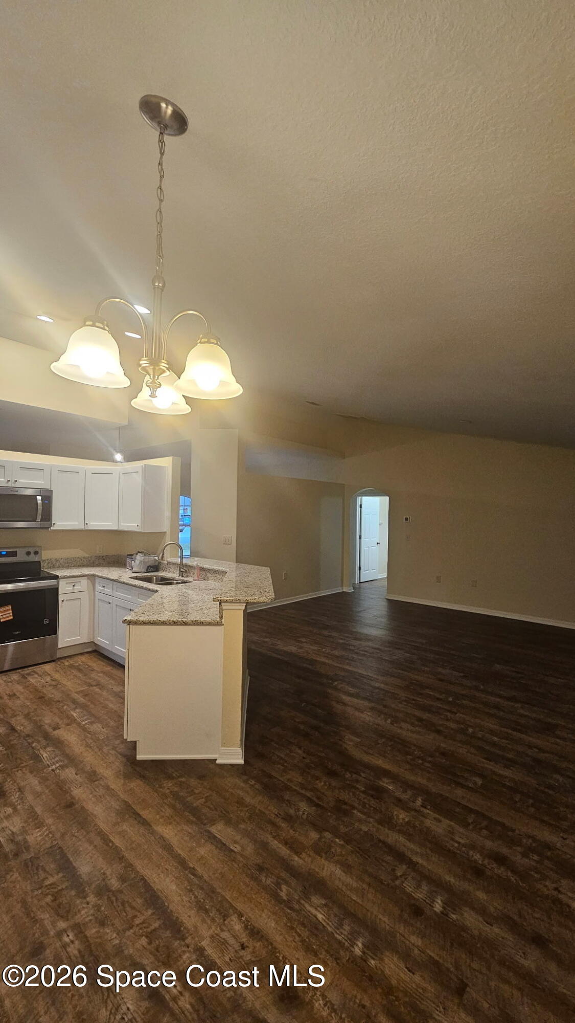 6150 Dees Road, Unit 6 Cocoa, FL 32927 - Photo 5 of 24 Kitchen and living room