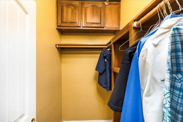 a bedroom with a bed and furniture