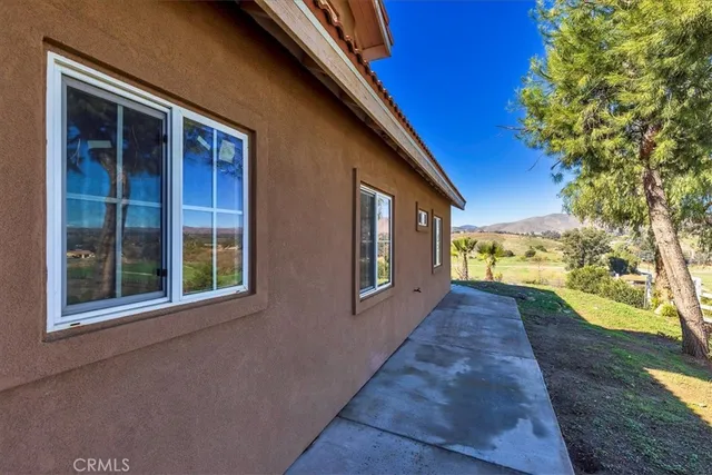 a view of street with residential houses