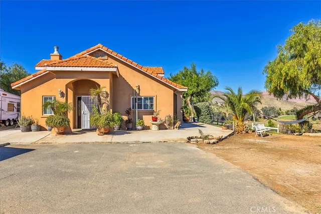 a view of a house with entertaining space